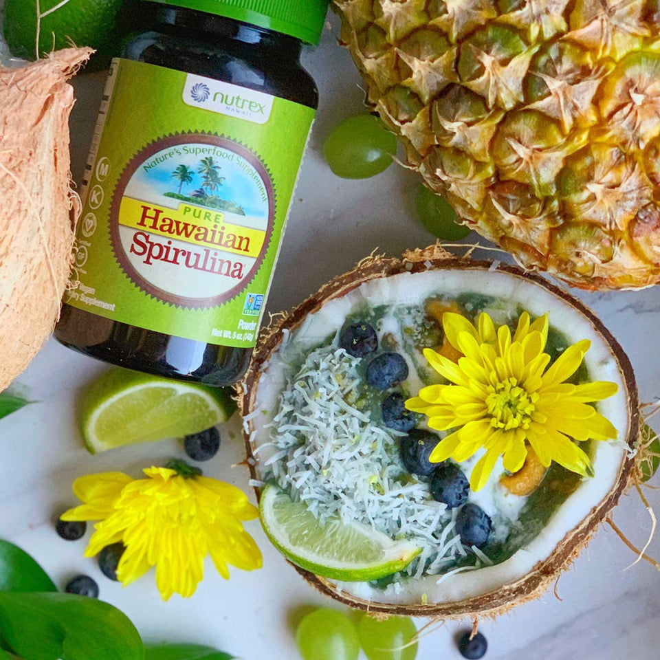 Nutrex Hawaiian Spirulina Pacifica bottle with tropical fruits